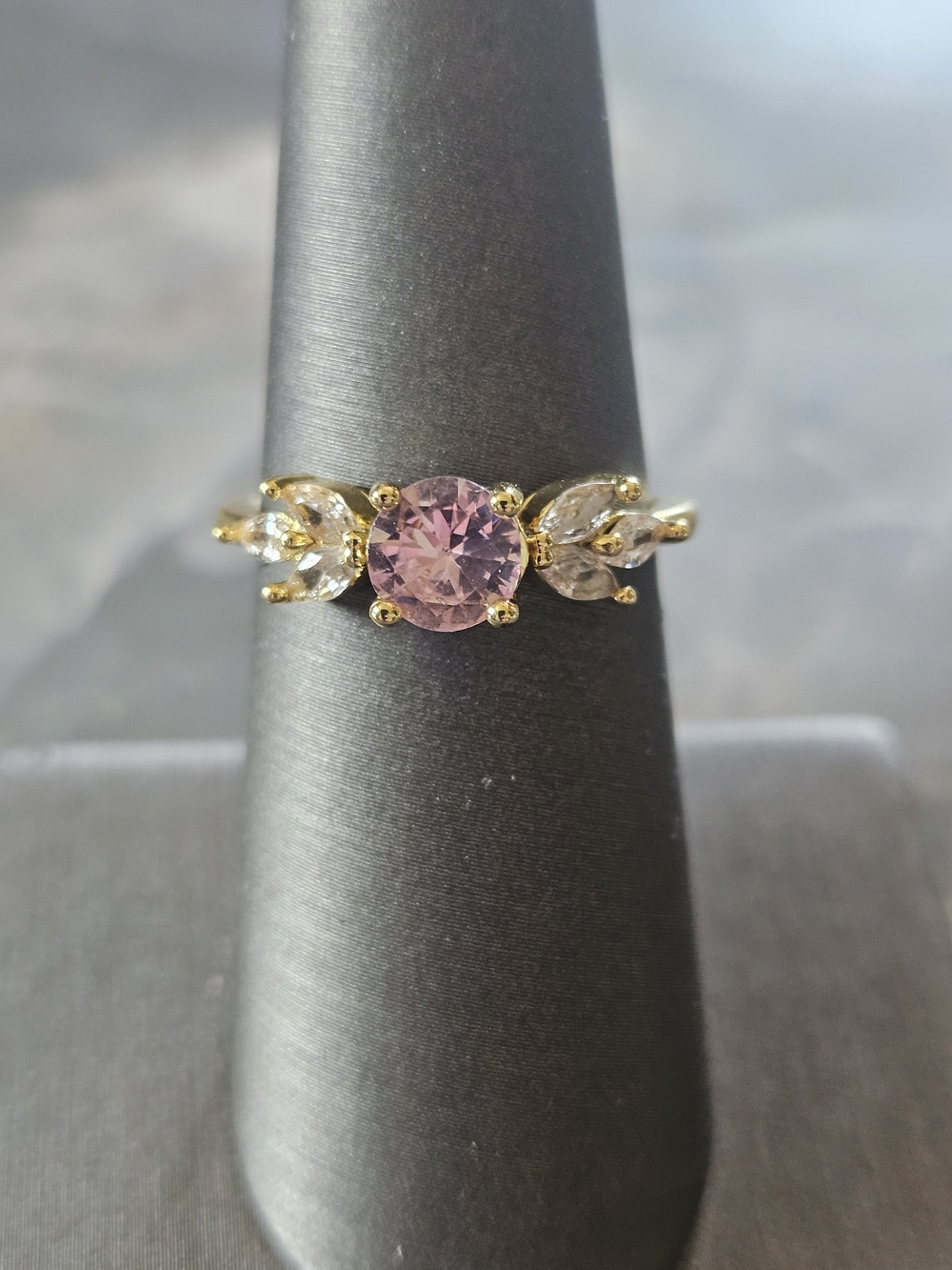 Gold Ring with Pink Center Stone and Leaf Accent
